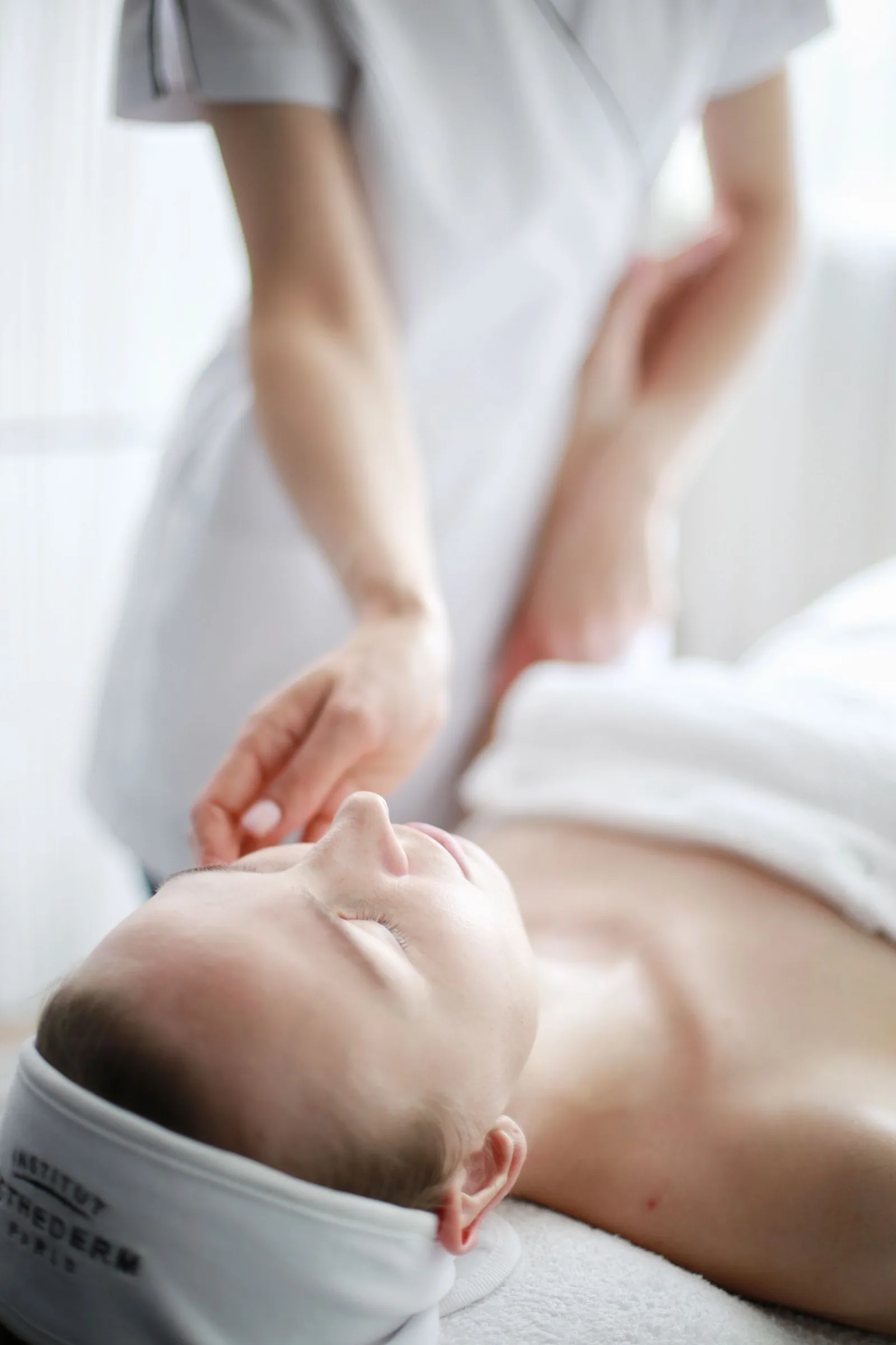 Gentle hands used during a light-touch complementary treatment